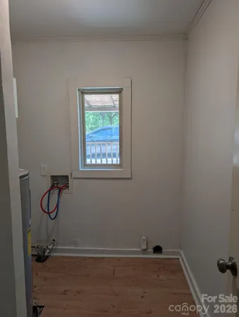 a view of room with racks on the wall