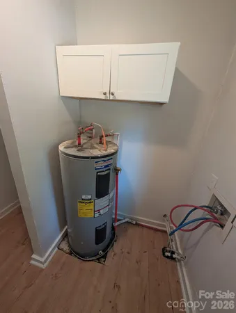 a view of cabinets with sink