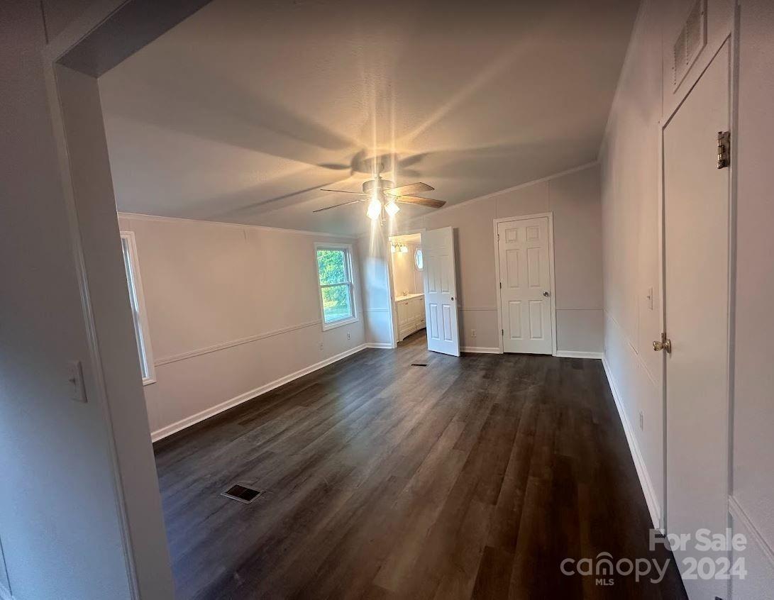 1770 Dark Corner Road Rutherfordton, NC 28139 - Photo 12 of 26 wooden floor in an empty room with a window
