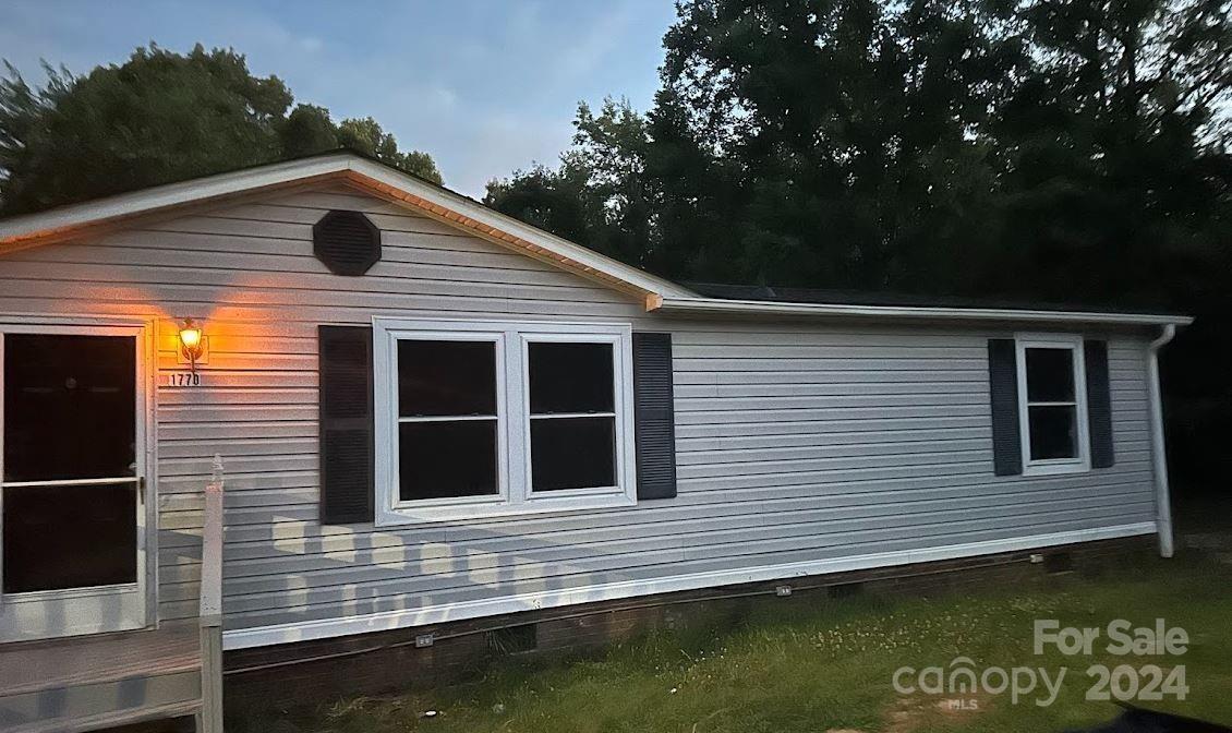 1770 Dark Corner Road Rutherfordton, NC 28139 - Photo 2 of 26 a view of a house with a large window