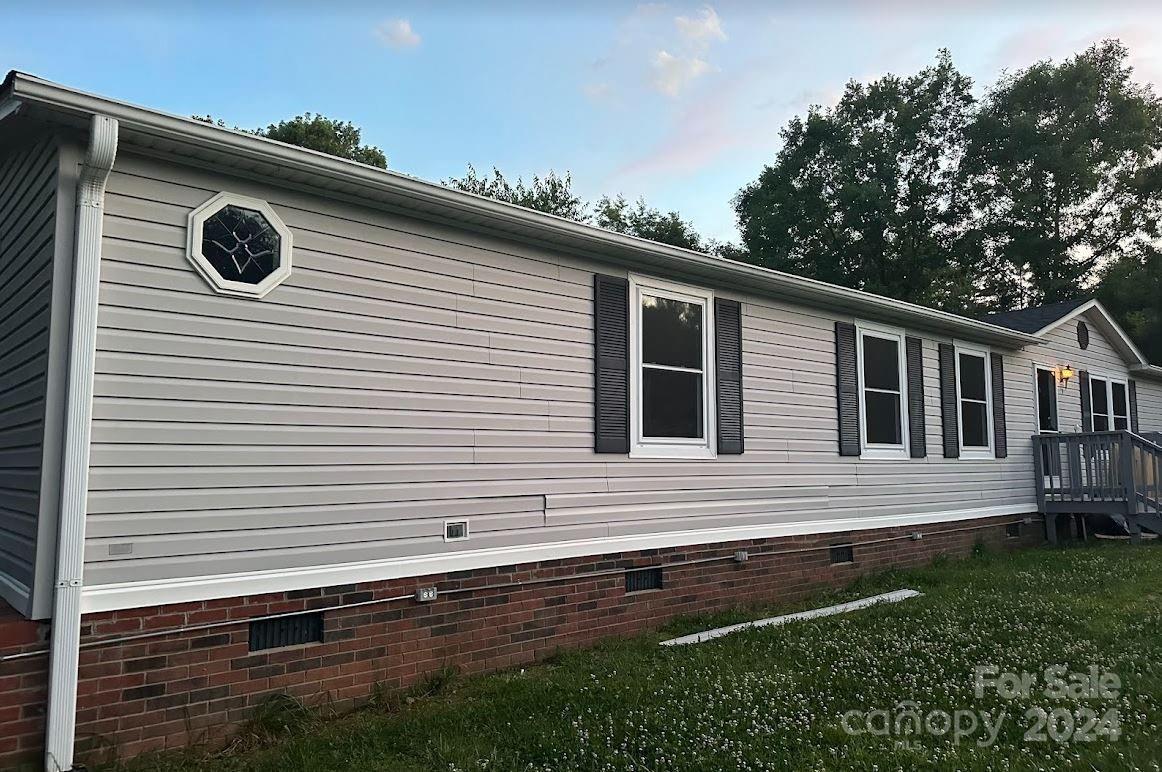 1770 Dark Corner Road Rutherfordton, NC 28139 - Photo 3 of 26 a front view of a house with a yard