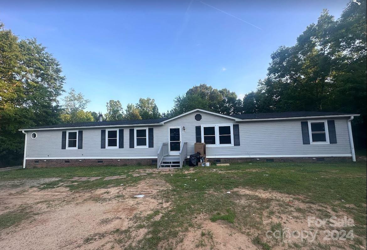 1770 Dark Corner Road Rutherfordton, NC 28139 - Photo 5 of 26 a house that has tree in front of it