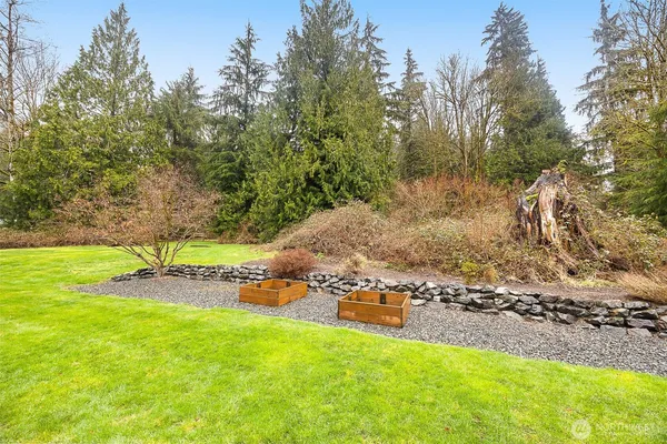 a view of a yard with an outdoor space