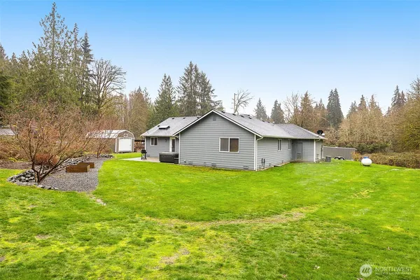 a house view with a garden space