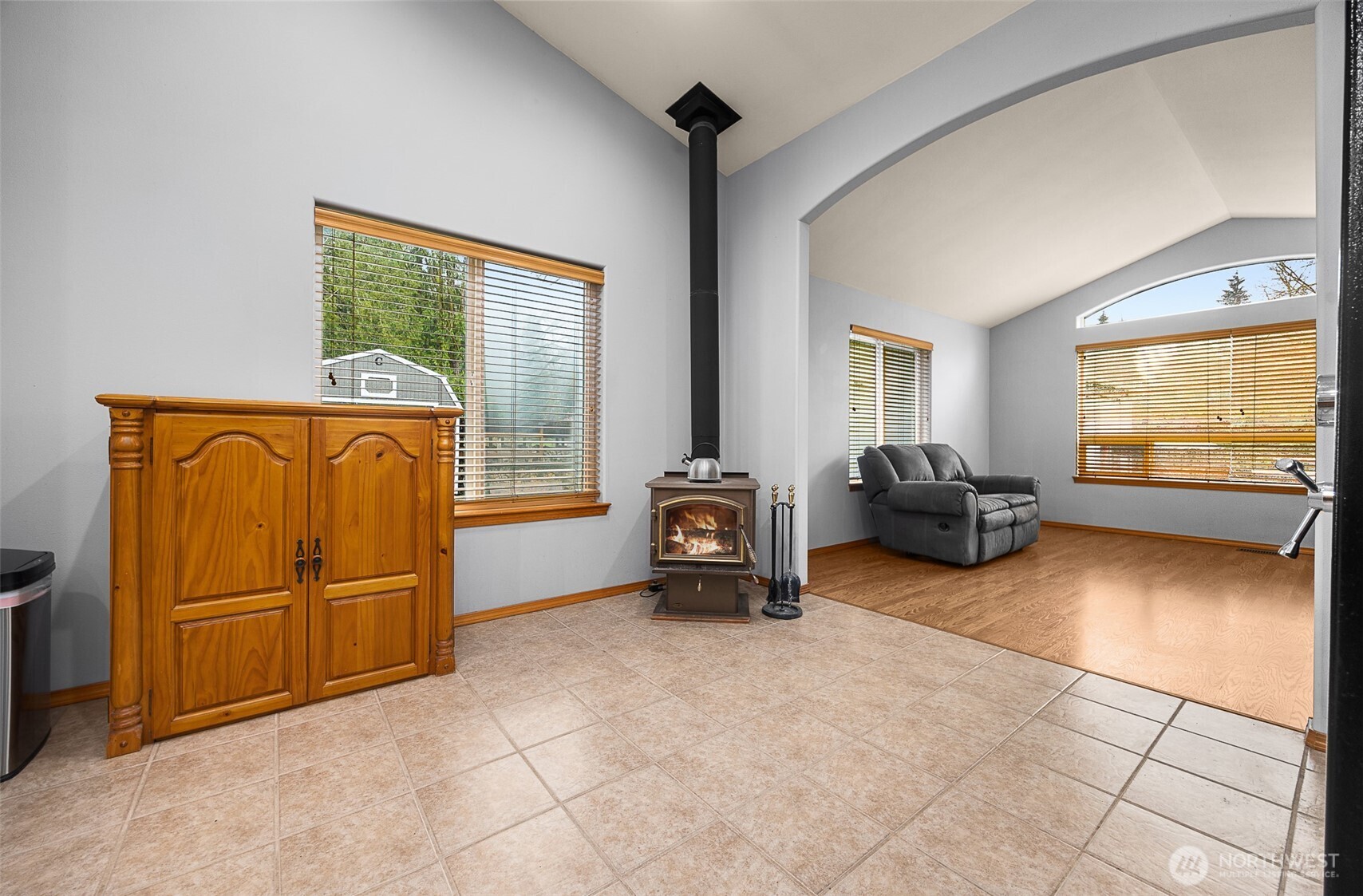 16617 Jim Creek Road Arlington, WA 98223 - Photo 7 of 40 a living room with furniture and a flat screen tv