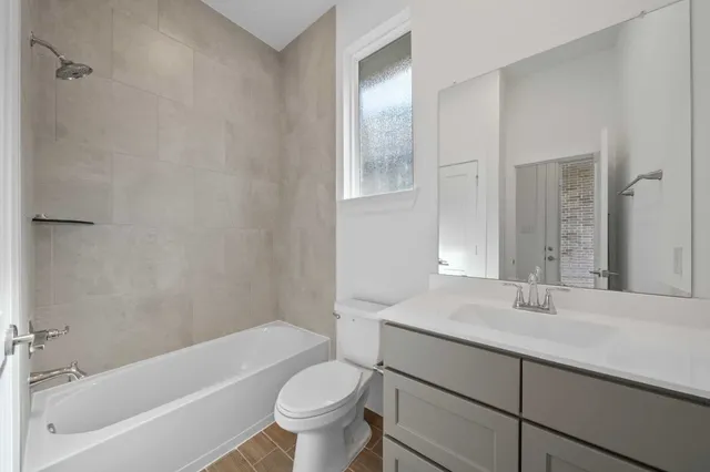 a bathroom with a sink toilet and bathtub