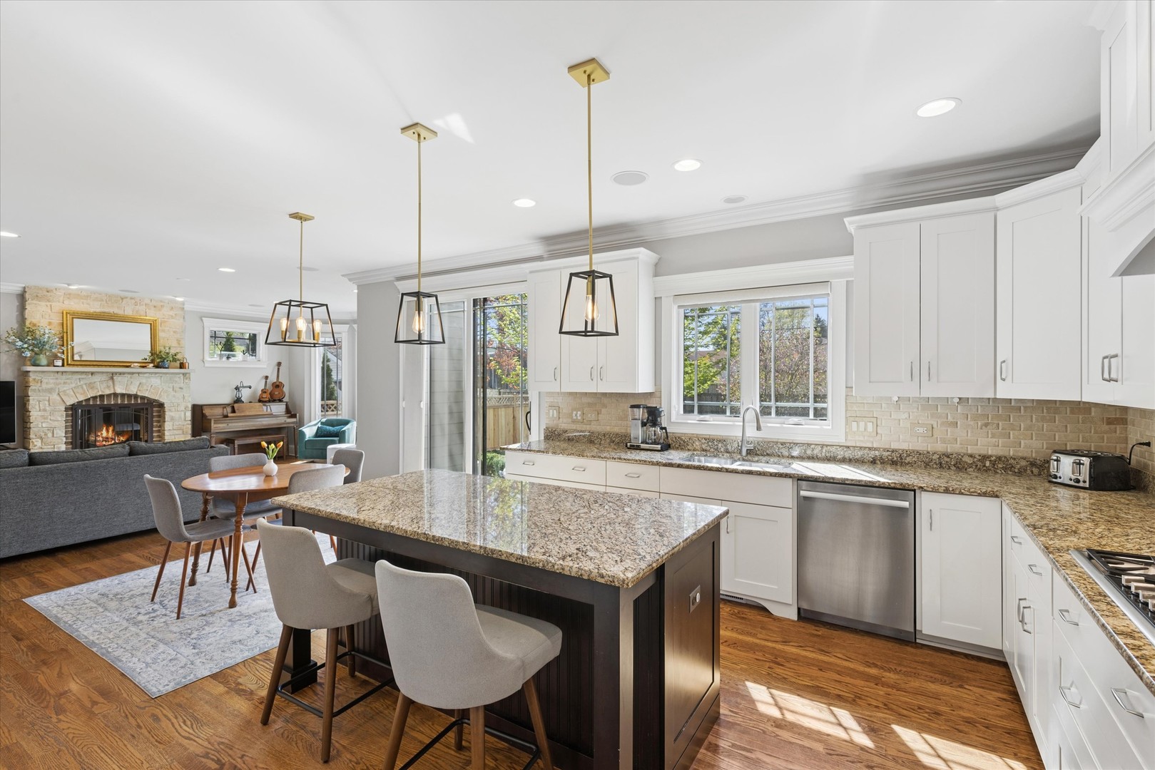 700 Swain Avenue Elmhurst, IL 60126 - Photo 11 of 33 a kitchen with center island table and chairs