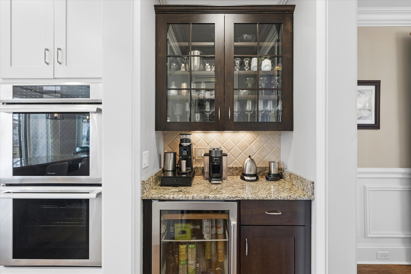 700 Swain Avenue Elmhurst, IL 60126 - Photo 12 of 33 a kitchen with granite countertop stove top oven and cabinets