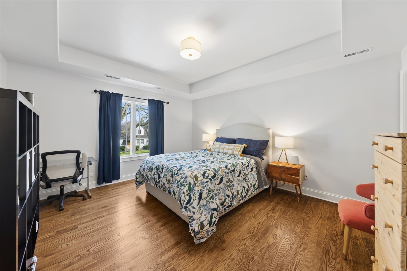 700 Swain Avenue Elmhurst, IL 60126 - Photo 25 of 33 a bedroom with a bed and a chair in it