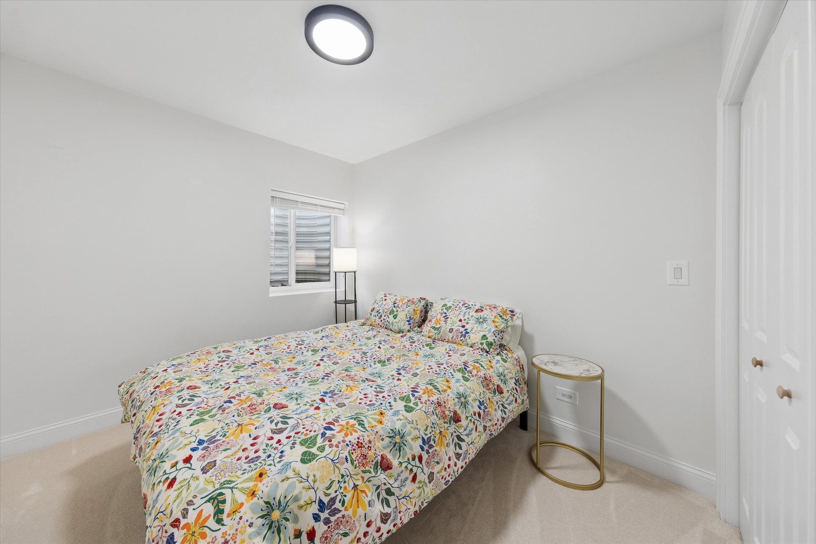 700 Swain Avenue Elmhurst, IL 60126 - Photo 29 of 33 a bedroom with a bed and a window