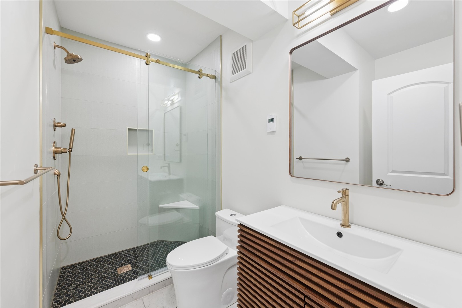 700 Swain Avenue Elmhurst, IL 60126 - Photo 30 of 33 a bathroom with a sink toilet and shower