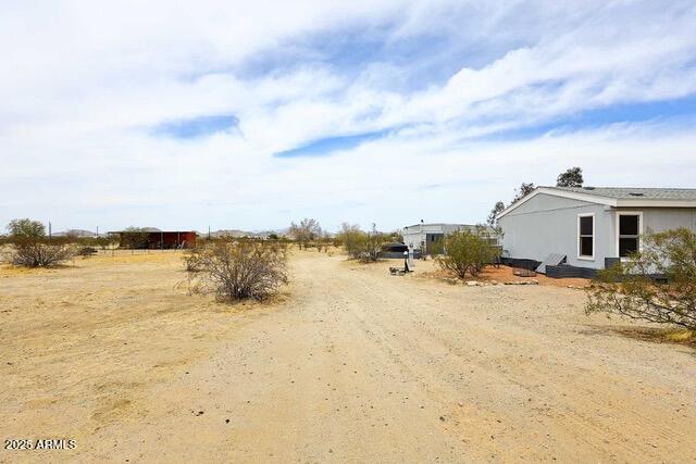 53404 West Candlelight Road Maricopa, AZ 85139 - Photo 23 of 25 Access to Rear Yard