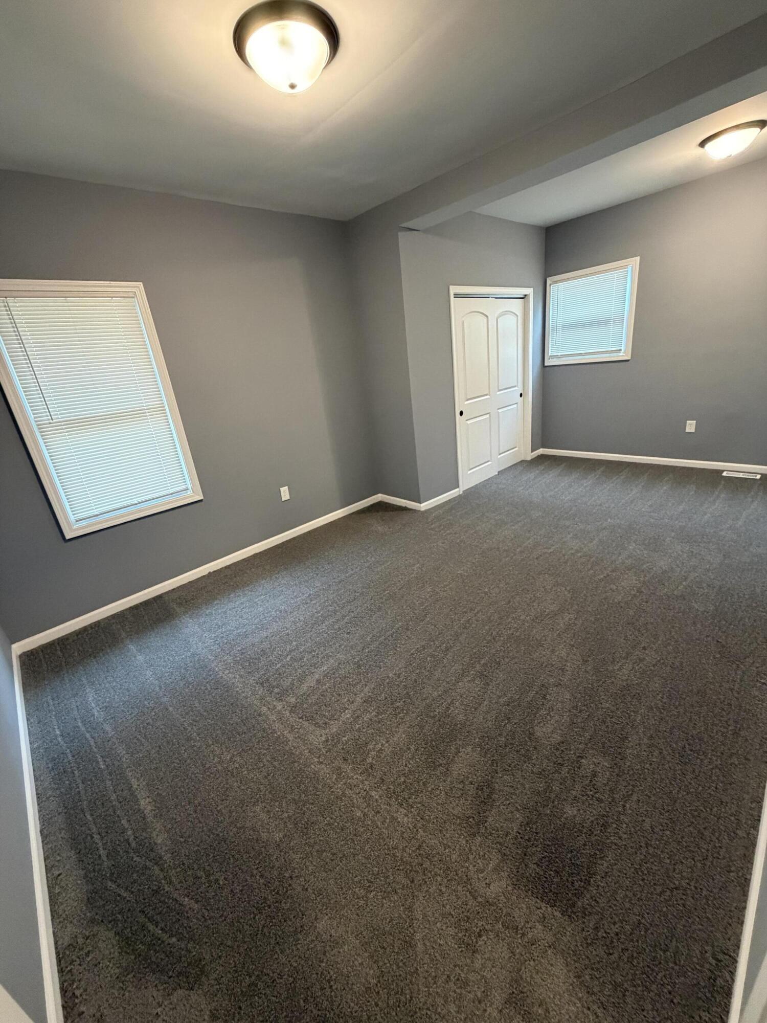 4450 Washington Street Gary, IN 46408 - Photo 13 of 25 an empty room with windows