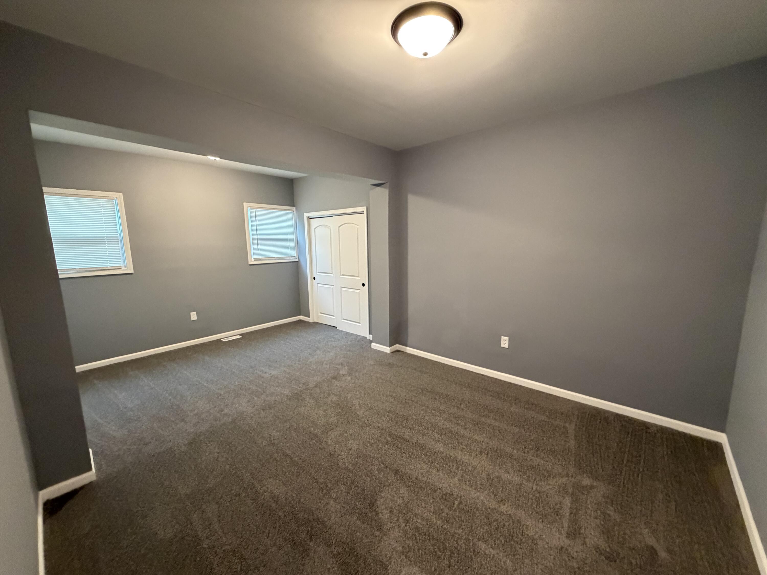 4450 Washington Street Gary, IN 46408 - Photo 16 of 25 an empty room with windows