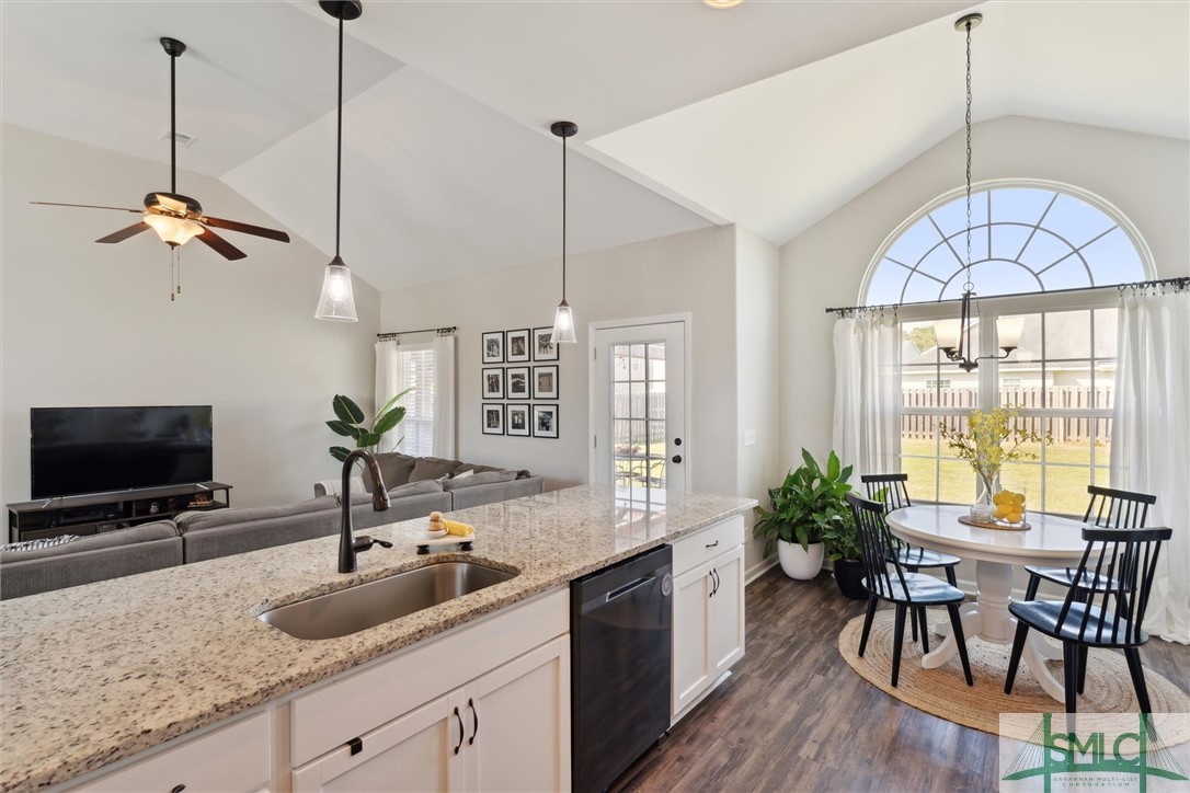159 Carlisle Way Savannah, GA 31419 - Photo 5 of 41 Clean, classic cabinets are topped with granite. B