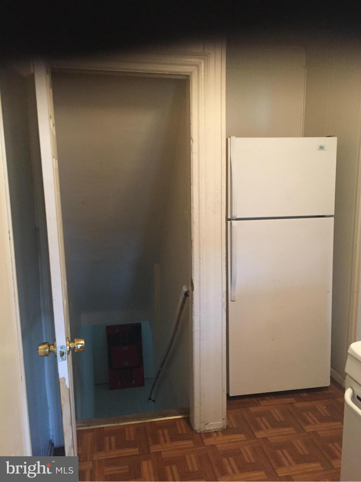 302 Old Riverside Road Baltimore, MD 21225 - Photo 5 of 10 a view of a room with wooden floor