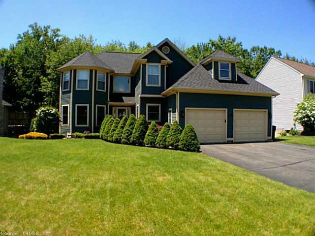 67 Kimberley Road Newington, CT 06111 - Photo 1 of 1 a front view of a house with a yard and garage
