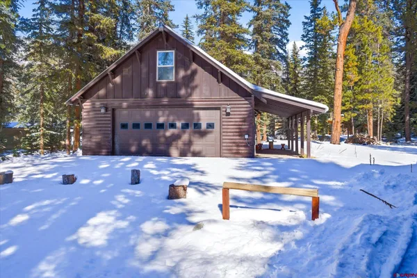 a view of house with yard