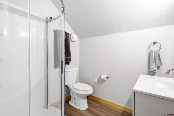 a bathroom with a toilet and a sink