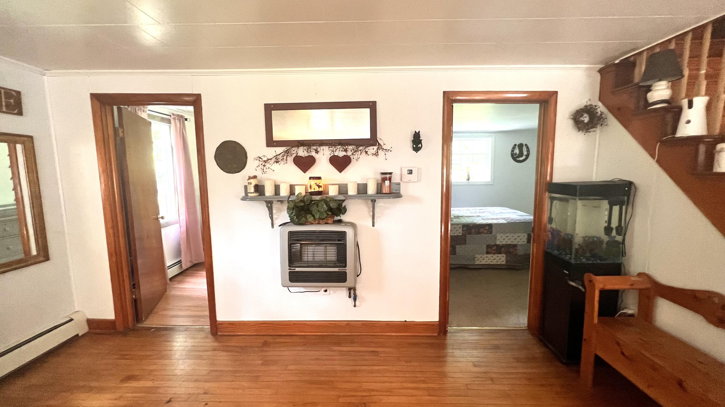 801 Stetson Road Exeter, ME 04435 - Photo 25 of 53 25. Living area has two bedrooms off of