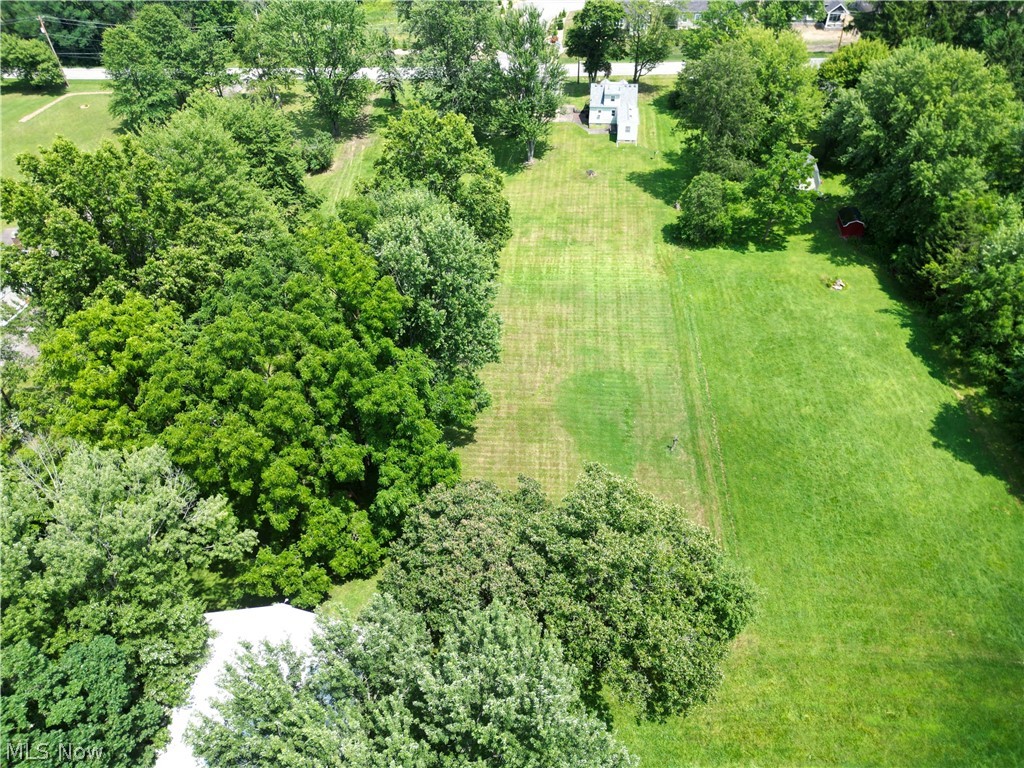 6324 Struthers Road Youngstown, OH 44514 - Photo 18 of 42 Expansive green space featuring a cleared, level lawn and mature trees