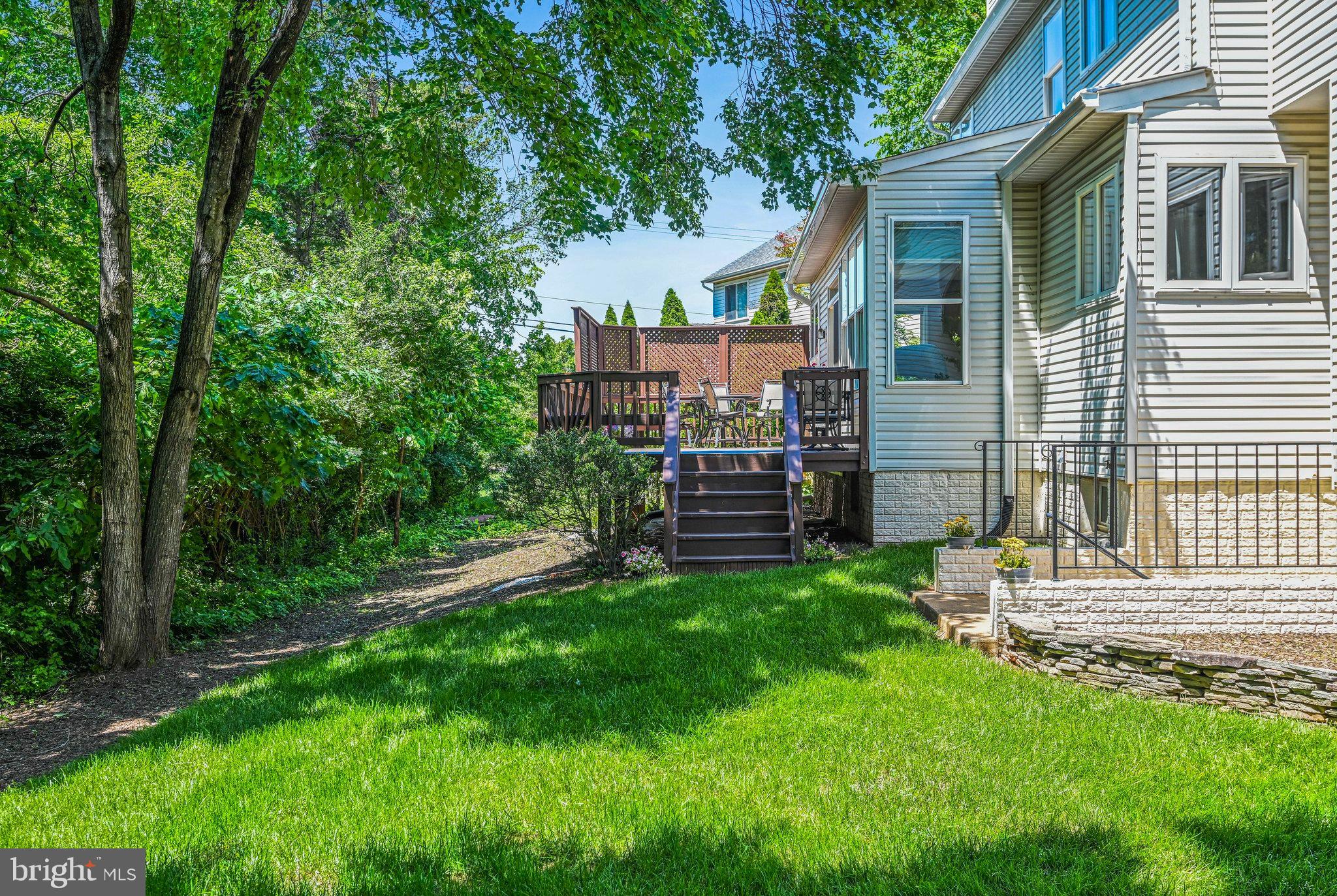46865 Backwater Drive Sterling, VA 20164 - Photo 47 of 53 a view of a house with backyard and a tree