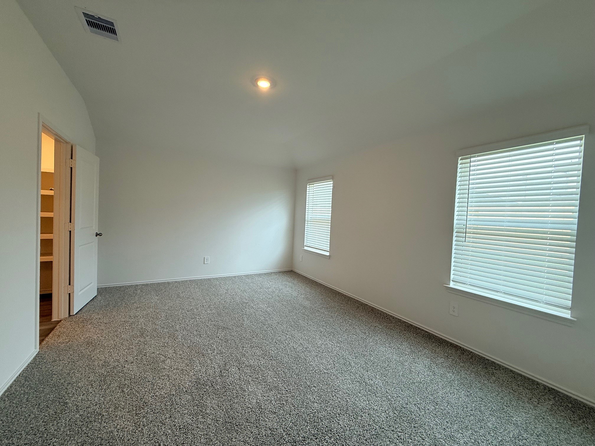 3807 Axyl Run Fulshear, TX 77423 - Photo 16 of 29 an empty room with windows