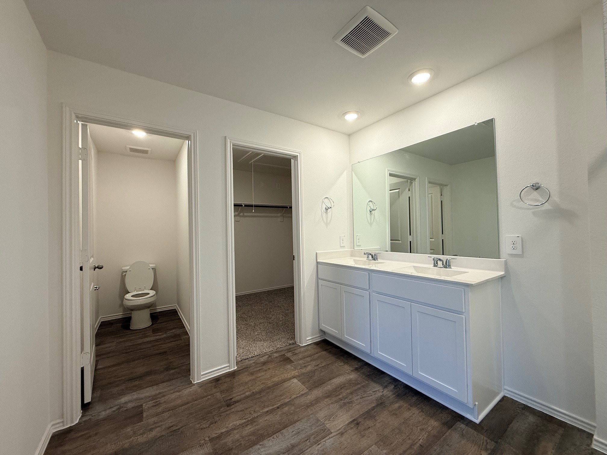 3807 Axyl Run Fulshear, TX 77423 - Photo 18 of 29 a bathroom with a sink and mirror