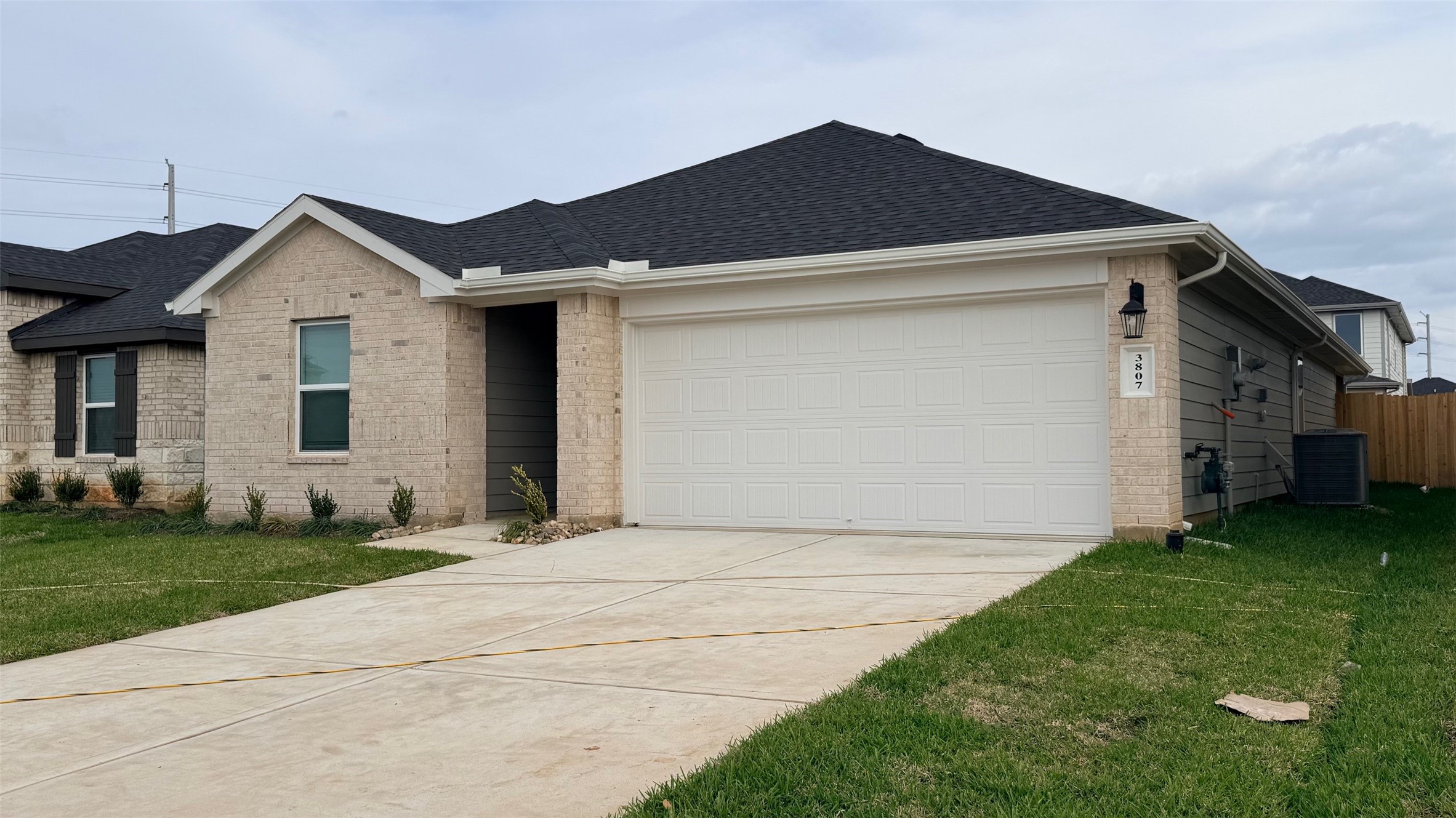 3807 Axyl Run Fulshear, TX 77423 - Photo 2 of 29 a front view of a house with a yard
