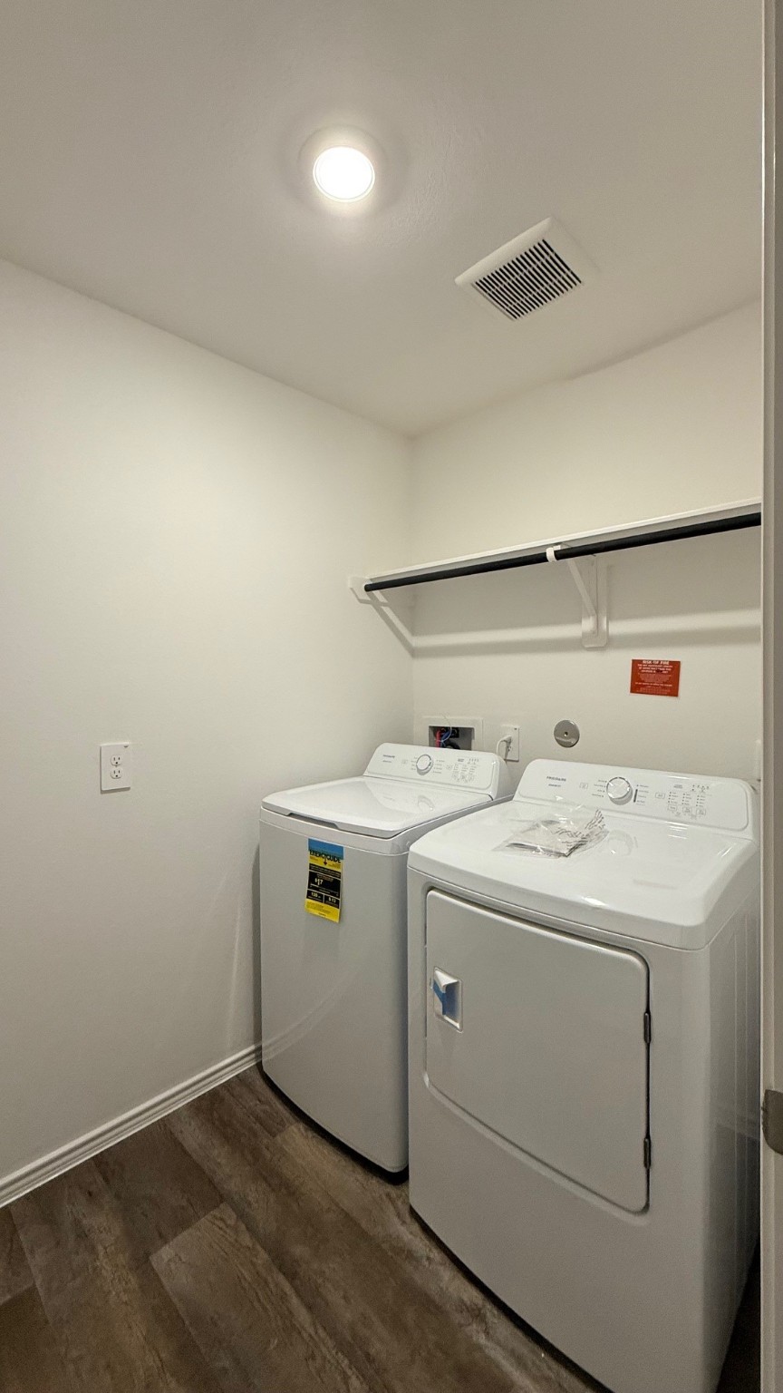 3807 Axyl Run Fulshear, TX 77423 - Photo 27 of 29 a utility room with dryer and washer