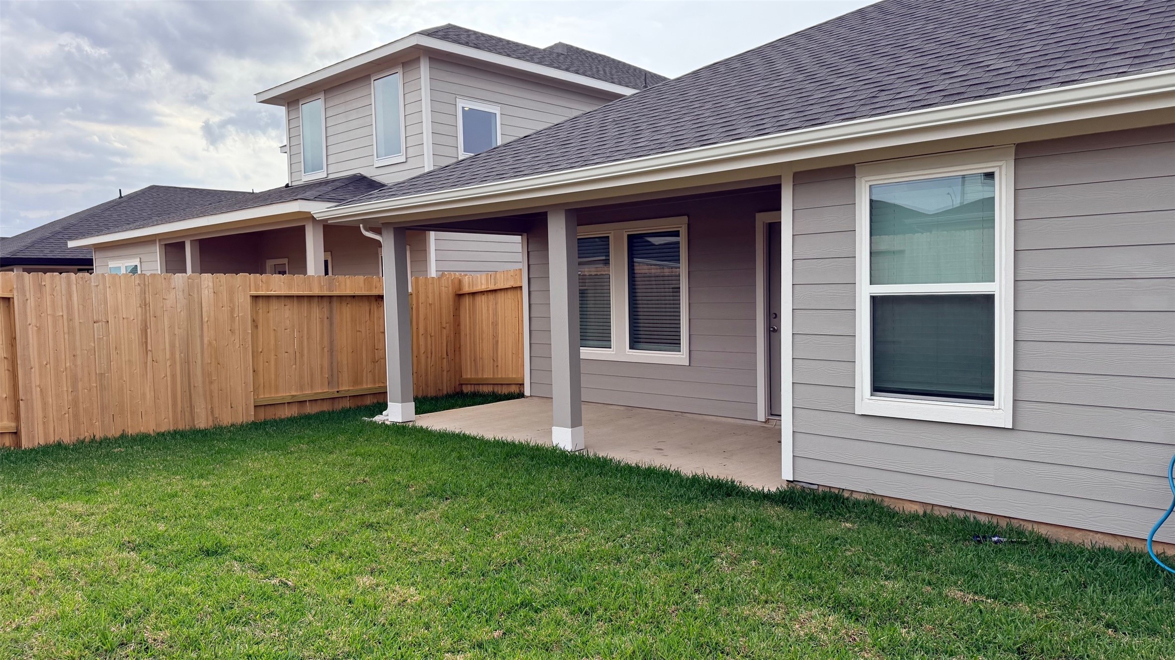 3807 Axyl Run Fulshear, TX 77423 - Photo 29 of 29 a front view of a house with a yard