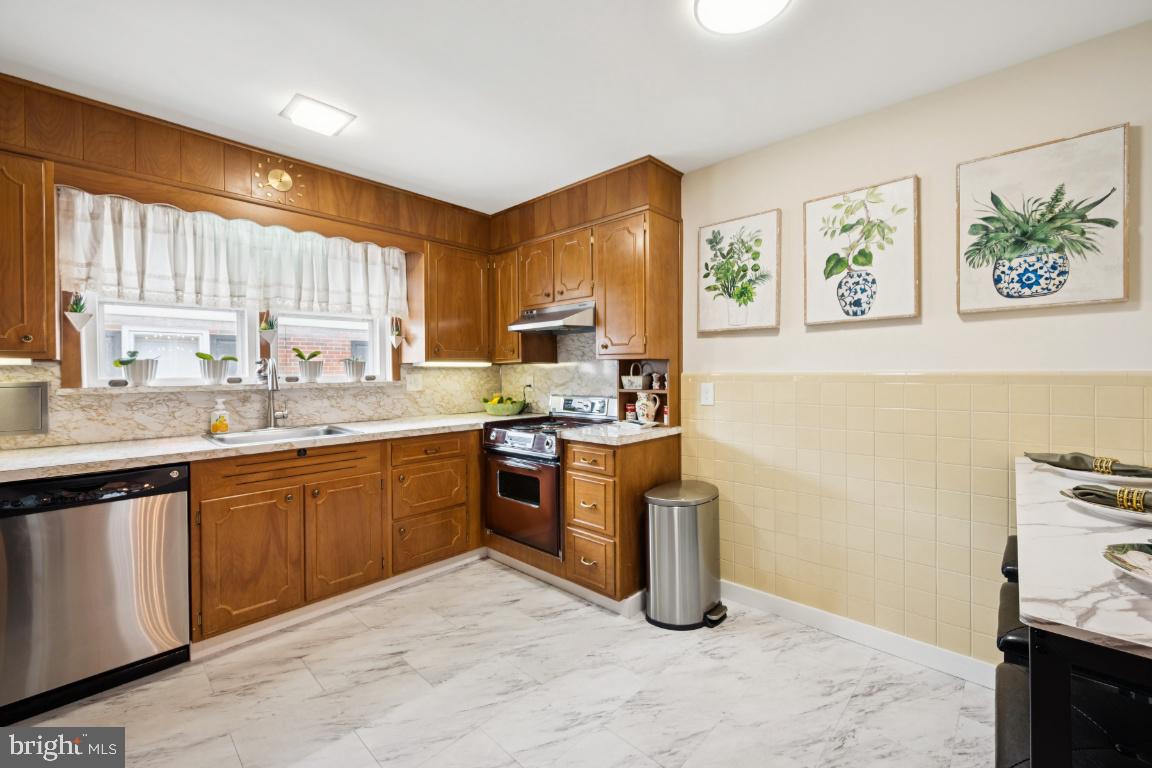 1608 Prospect Ridge Boulevard Haddon Heights, NJ 08035 - Photo 12 of 28 a kitchen with a sink stove and microwave