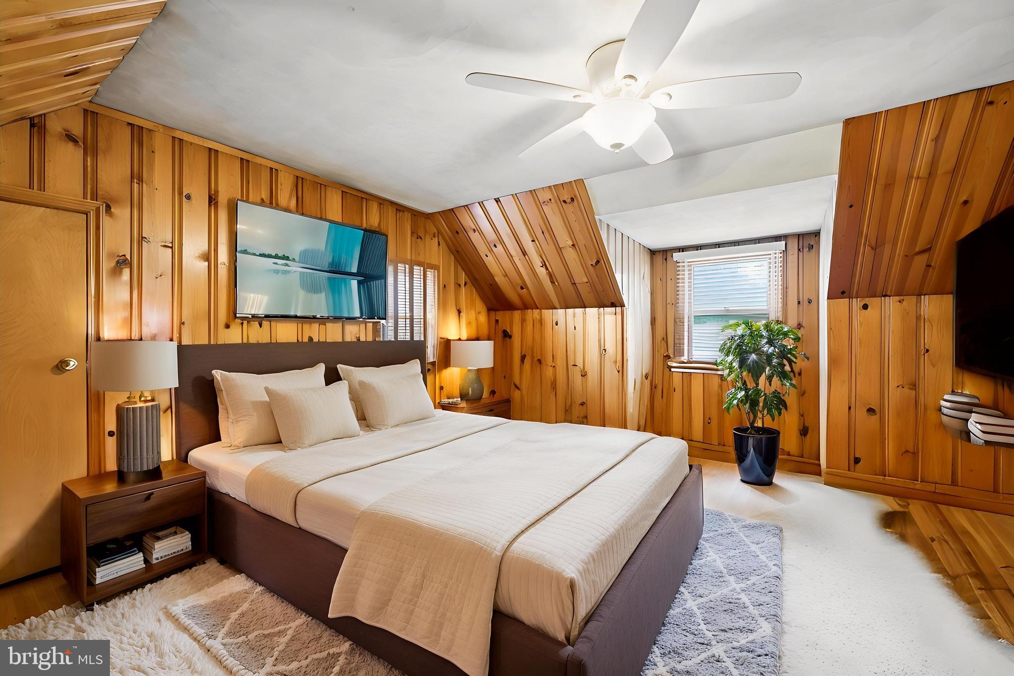 1608 Prospect Ridge Boulevard Haddon Heights, NJ 08035 - Photo 19 of 28 a bedroom with a bed dresser and a flat tv screen