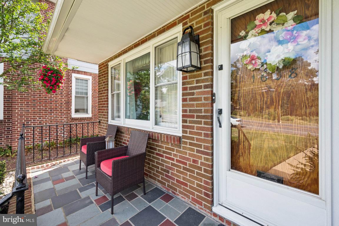 1608 Prospect Ridge Boulevard Haddon Heights, NJ 08035 - Photo 3 of 28 a view of a door with a bench and bench