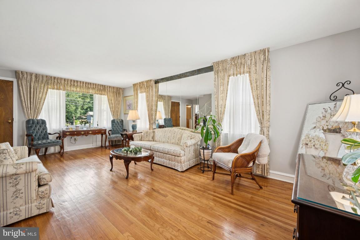1608 Prospect Ridge Boulevard Haddon Heights, NJ 08035 - Photo 8 of 28 a living room with furniture and a large window