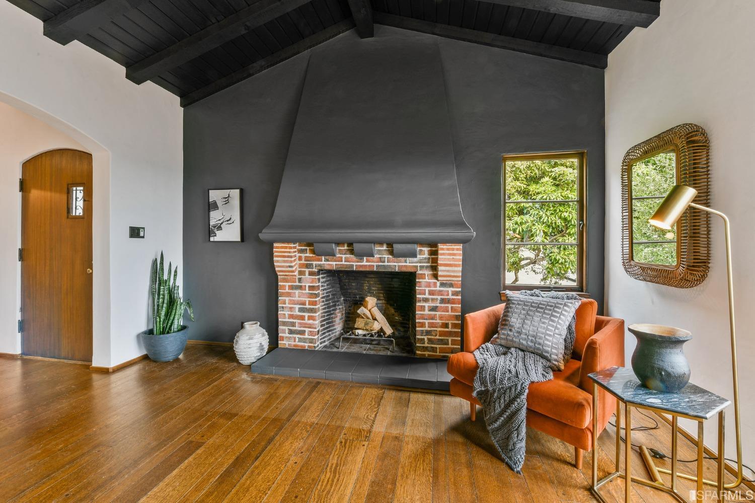 2515 Buena Vista Way Berkeley, CA 94708 - Photo 11 of 52 a living room with furniture and a fireplace