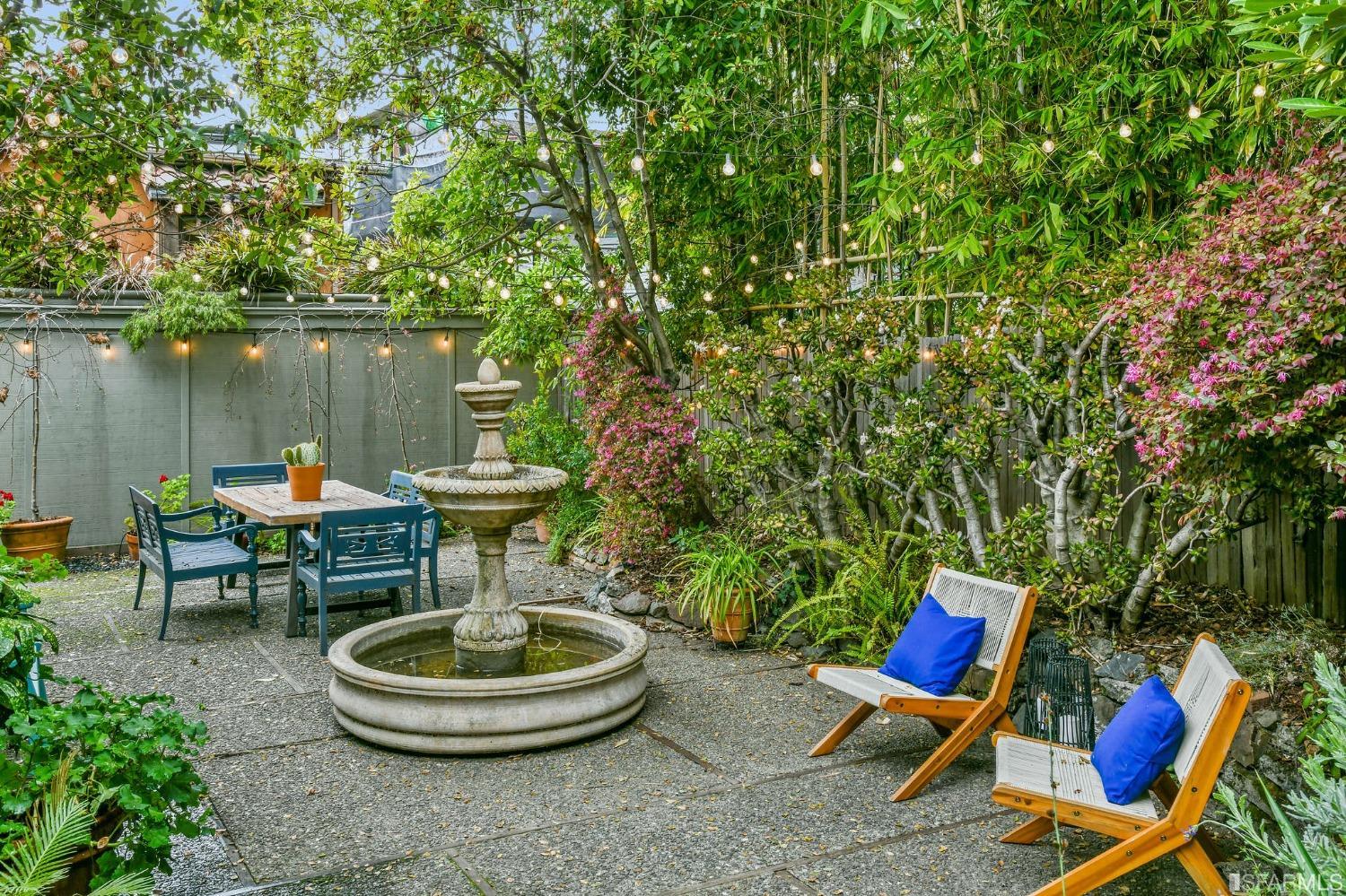 2515 Buena Vista Way Berkeley, CA 94708 - Photo 43 of 52 a backyard of a house with table and chairs