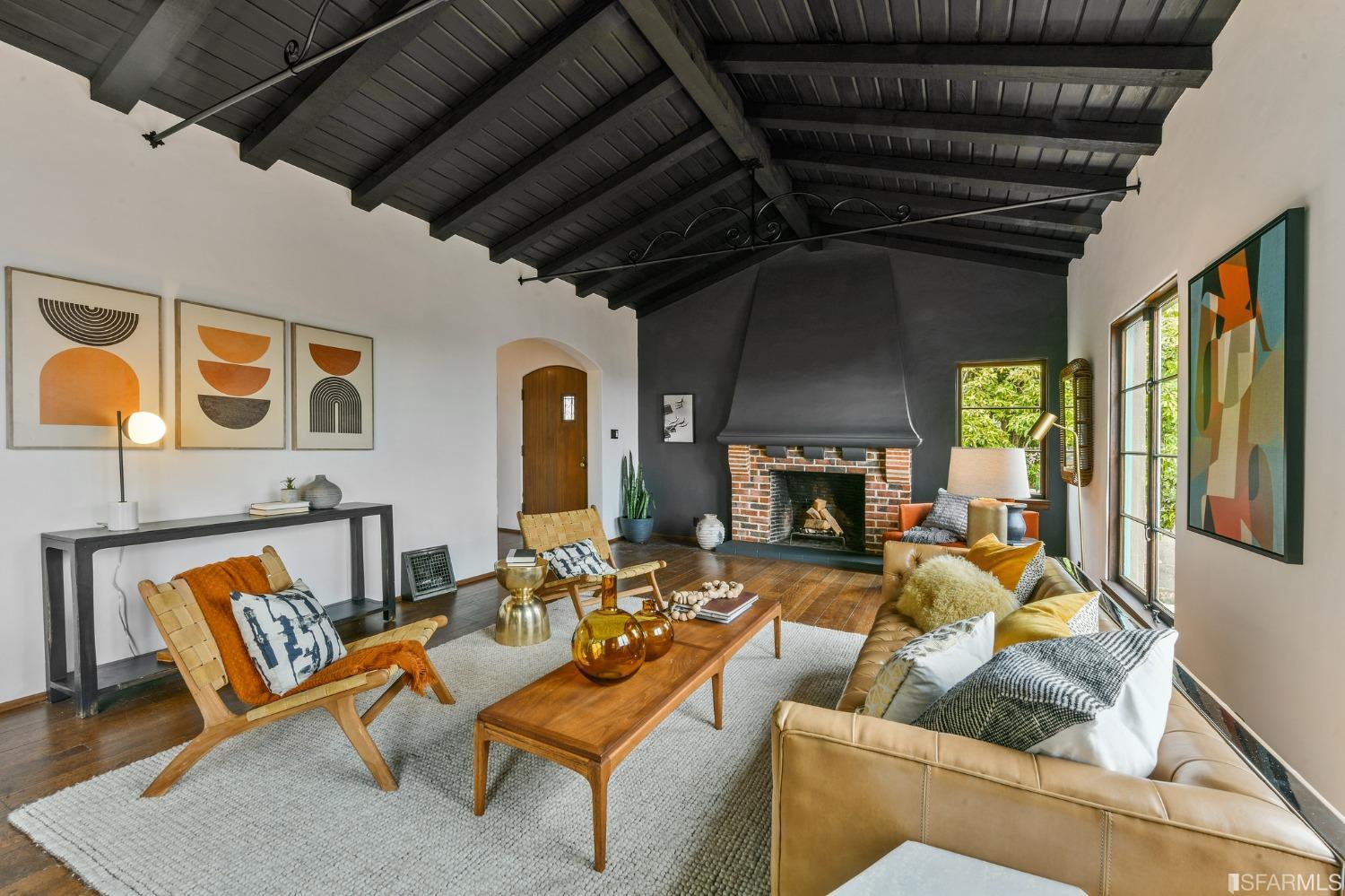 2515 Buena Vista Way Berkeley, CA 94708 - Photo 10 of 52 a living room with furniture a fireplace and a table