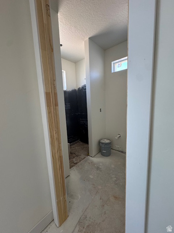 5005 North 75 East Enoch, UT 84721 - Photo 17 of 37 Full bath featuring a textured ceiling and walk in shower