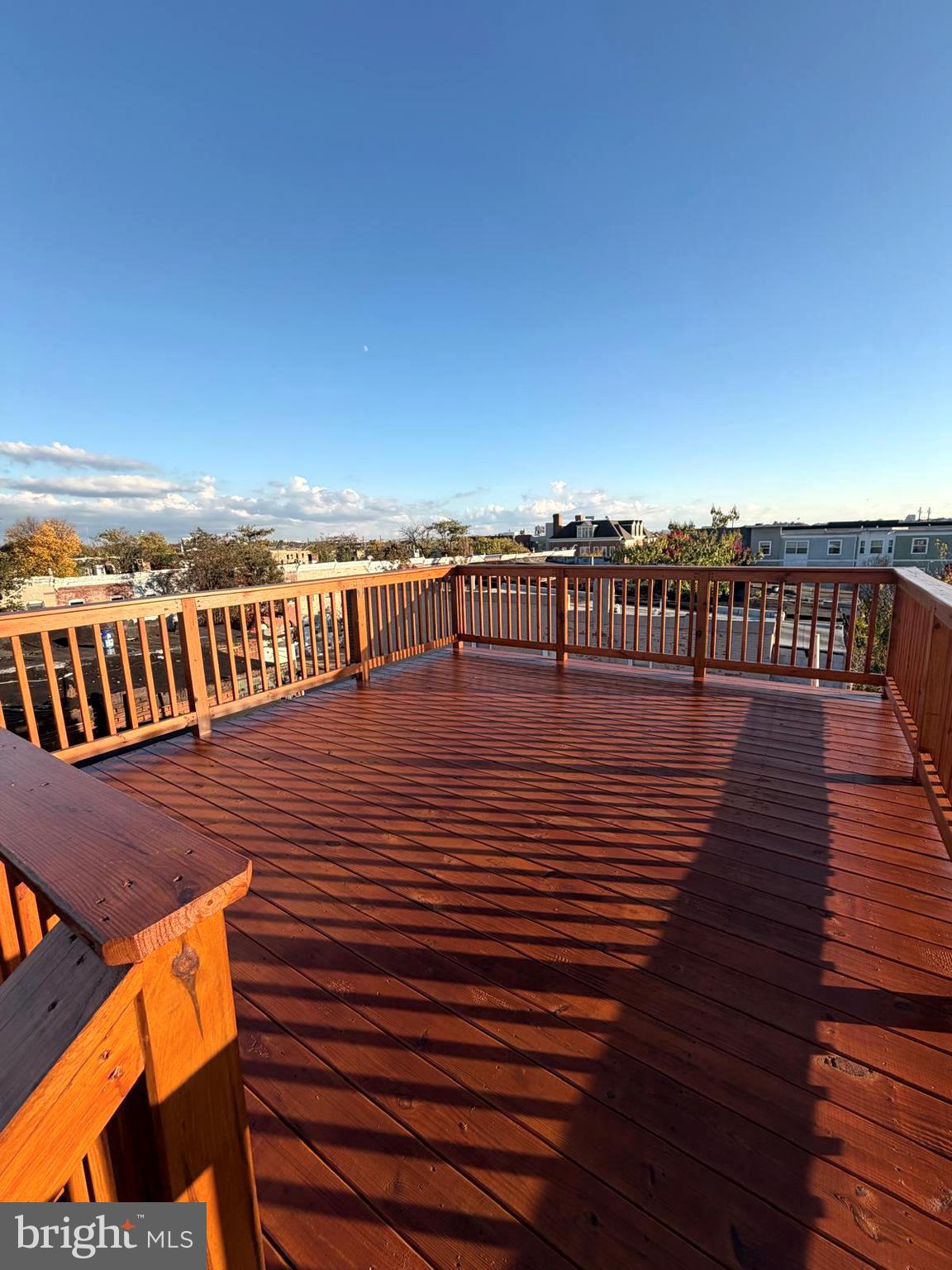 a view of roof deck with patio