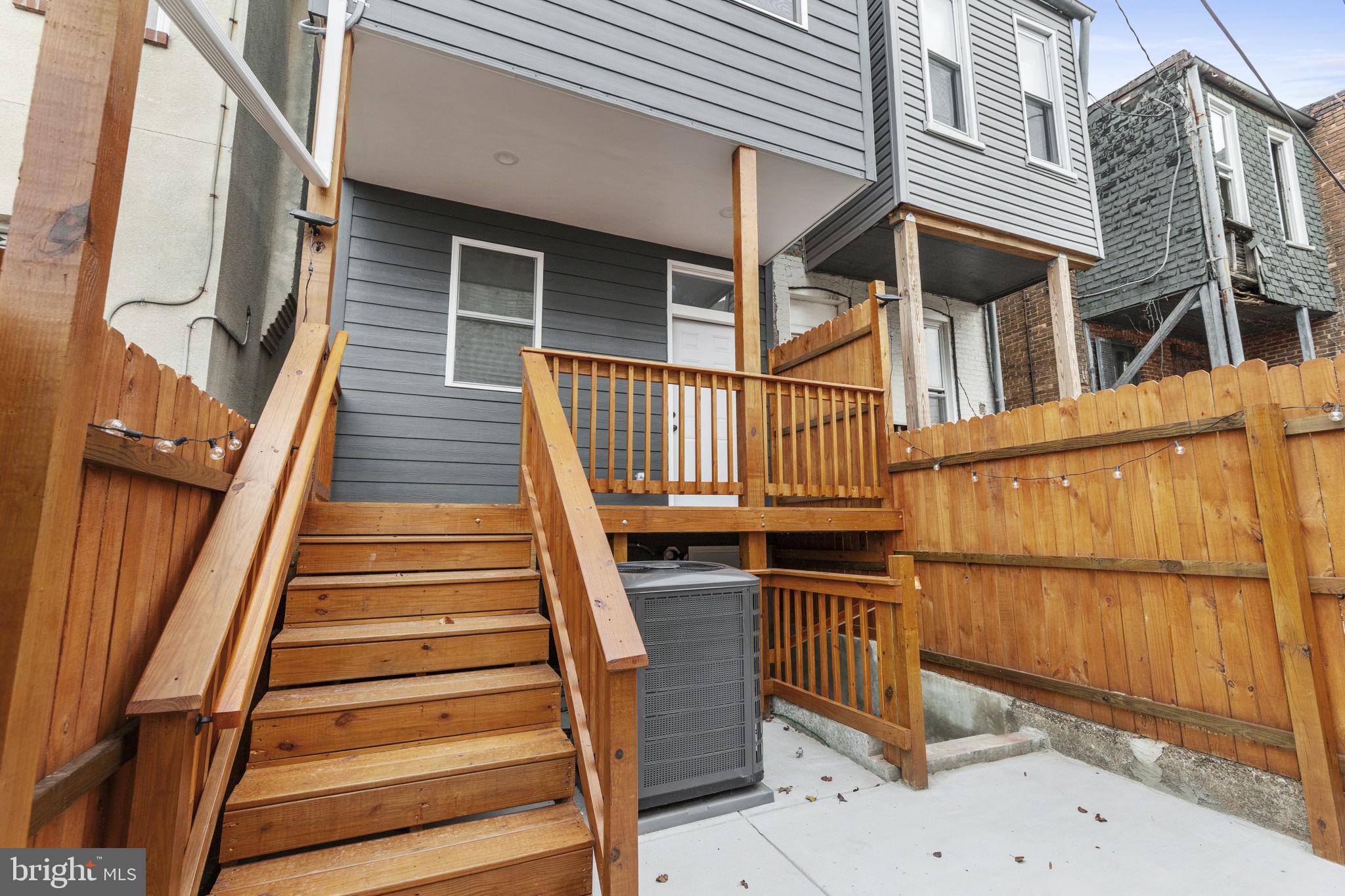 2245 East Preston Street Baltimore, MD 21213 - Photo 17 of 24 a view of entryway with wooden floor