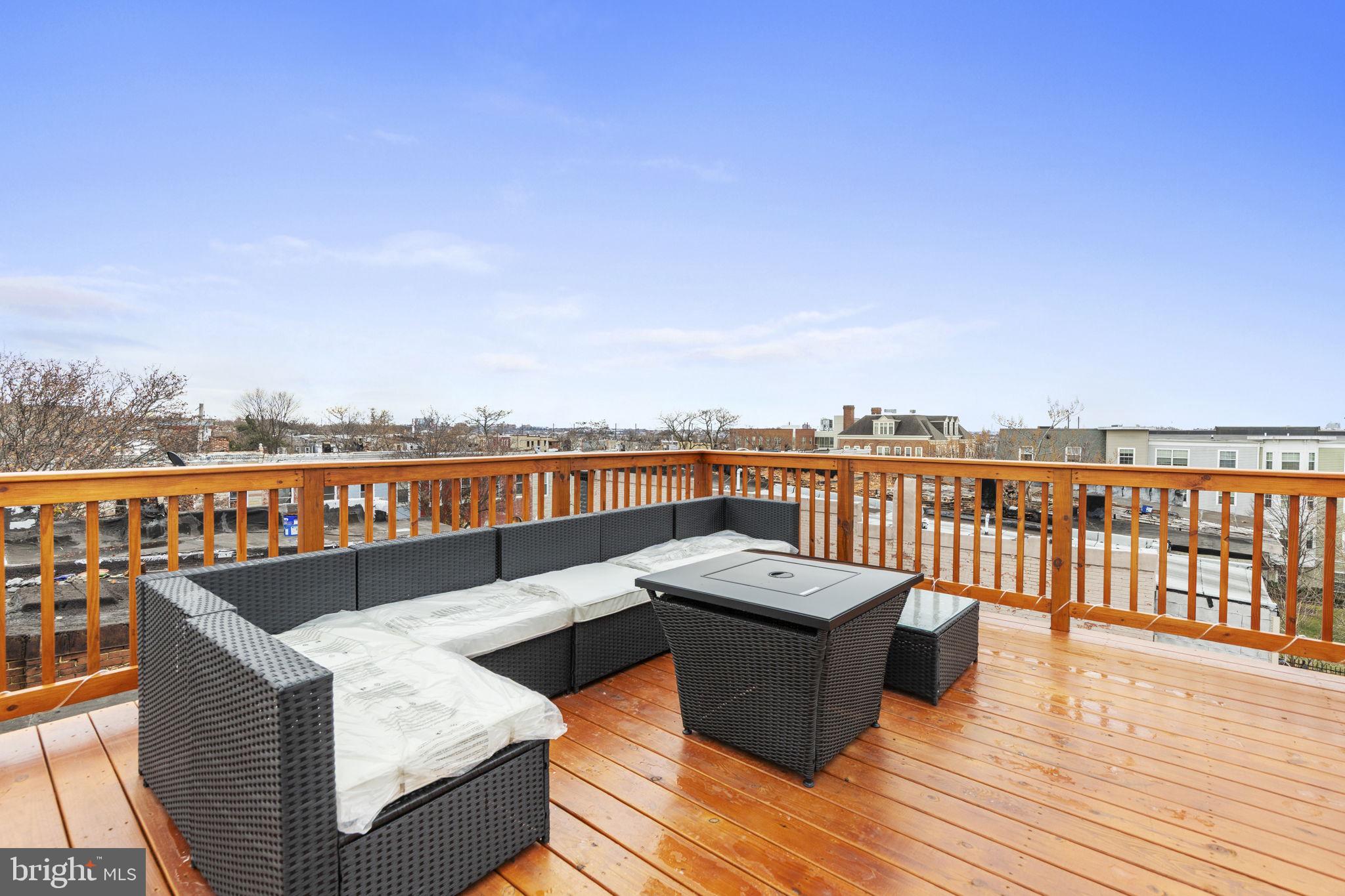 2245 East Preston Street Baltimore, MD 21213 - Photo 19 of 24 a view of roof deck with city view