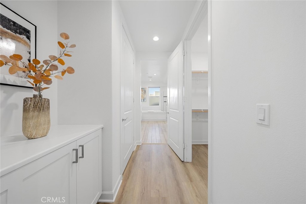 148 Follyhatch Irvine, CA 92618 - Photo 19 of 33 a view of hallway with wooden floor