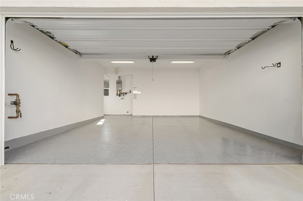 148 Follyhatch Irvine, CA 92618 - Photo 29 of 33 a view of a livingroom with an empty space