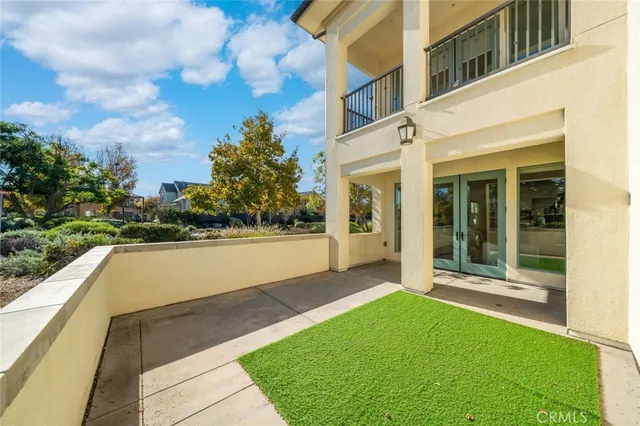 a view of balcony with yard
