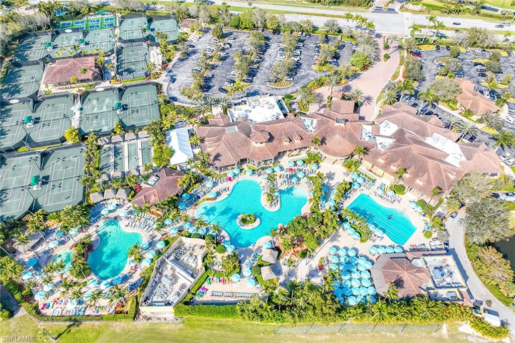 7440 Byrons Way Naples, FL 34113 - Photo 43 of 43 an aerial view of residential houses with outdoor space