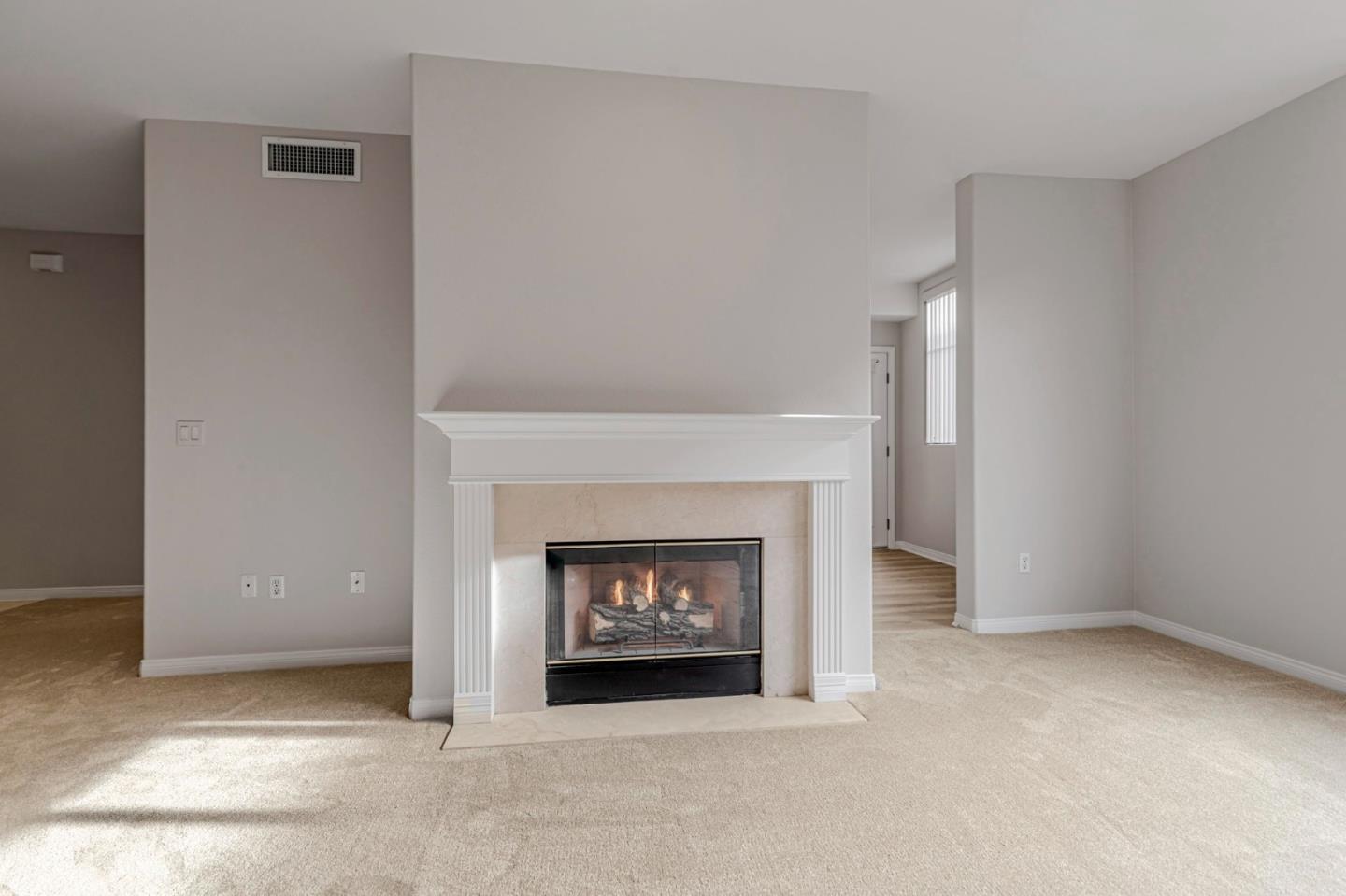 144 South 3rd Street, Unit 433 San Jose, CA 95112 - Photo 18 of 66 a living room with a fireplace