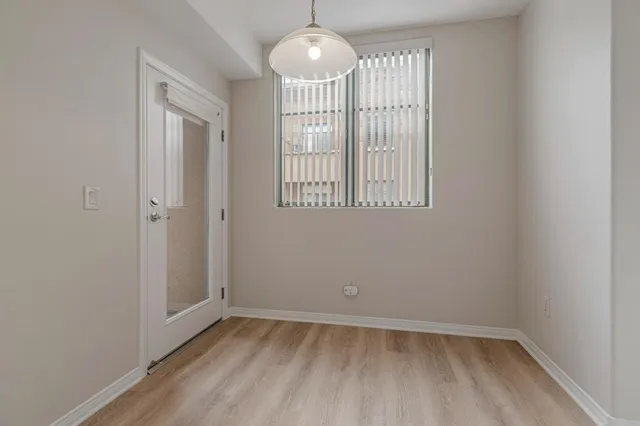 a bathroom with a double vanity sink and mirror