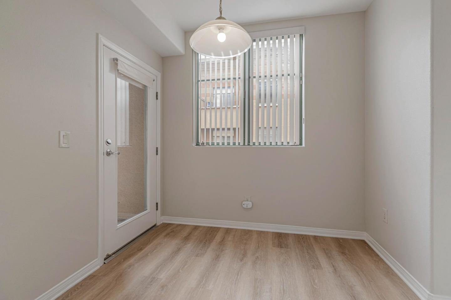 144 South 3rd Street, Unit 433 San Jose, CA 95112 - Photo 30 of 66 wooden floor in an empty room with a window
