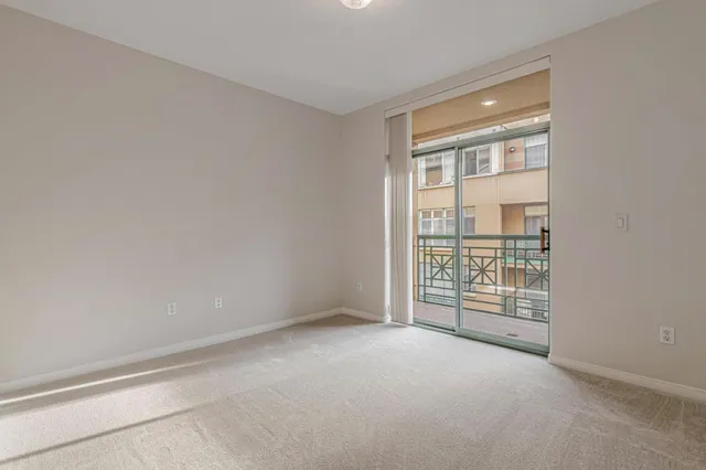 a bed room with furniture and a window